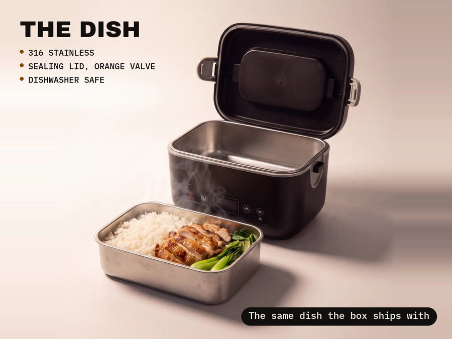 The heated box open with the dish beside it: 316 stainless, sealing lid with orange valve, dishwasher safe, the same dish the box ships with