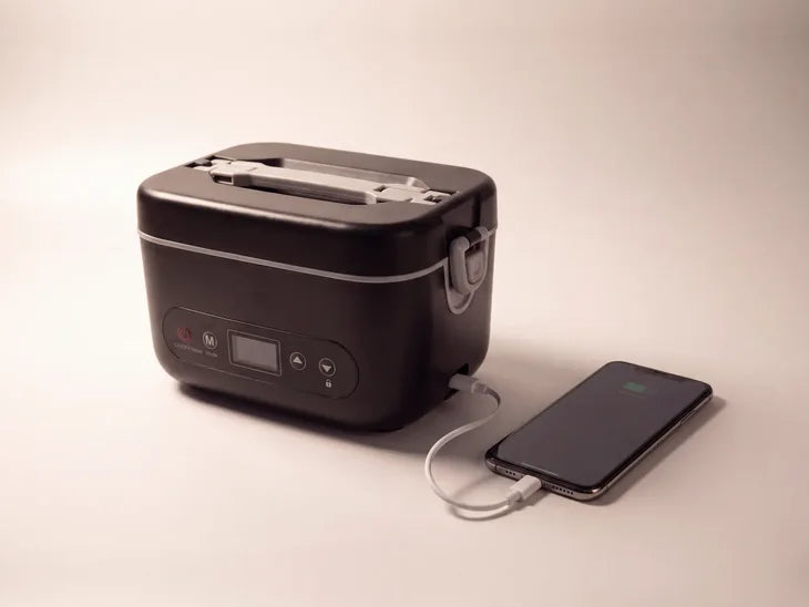 The box charging a phone through its own battery